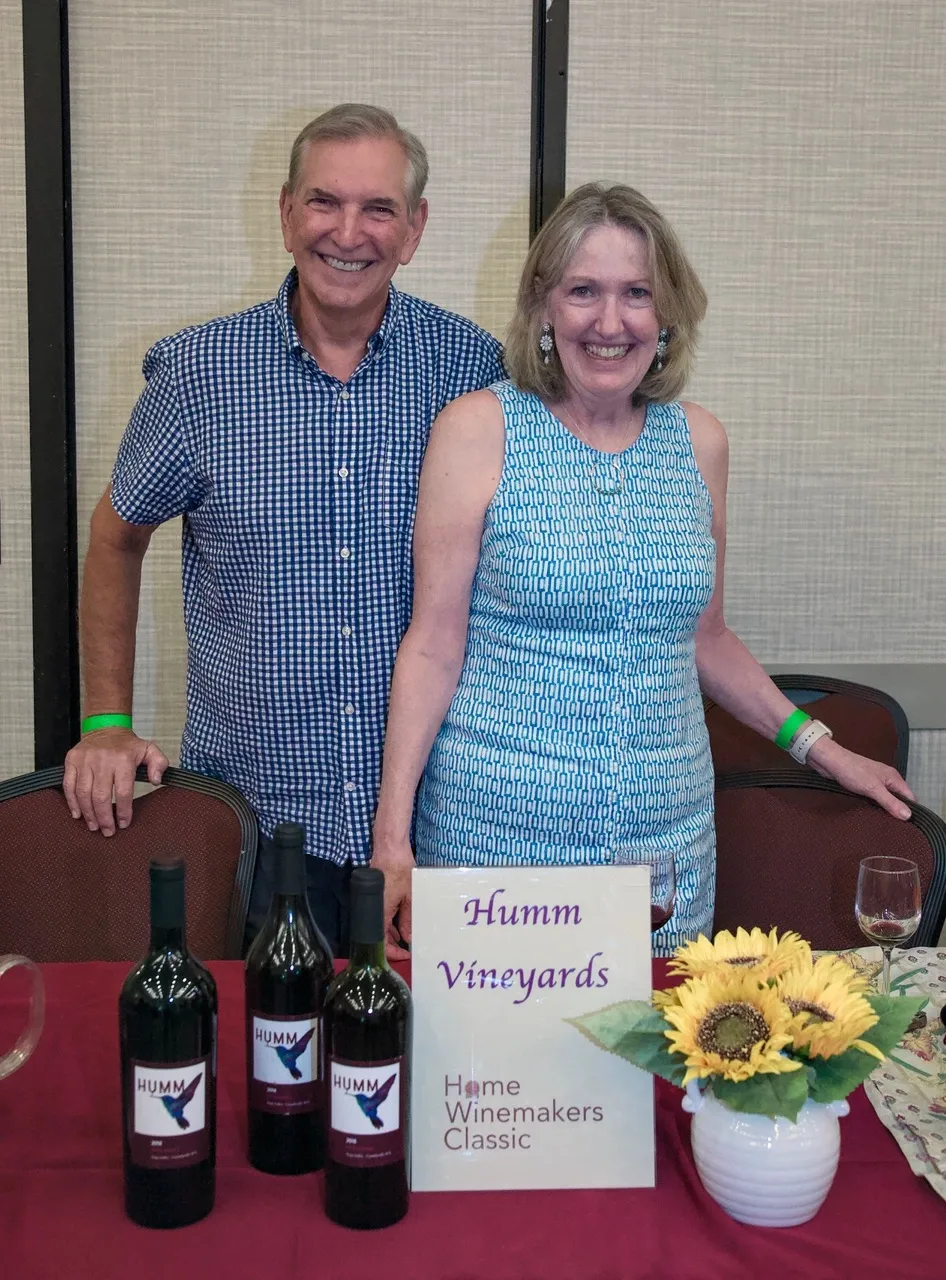 Maury and his wife at the Humm Vineyards display at the Home Winemakers Classic