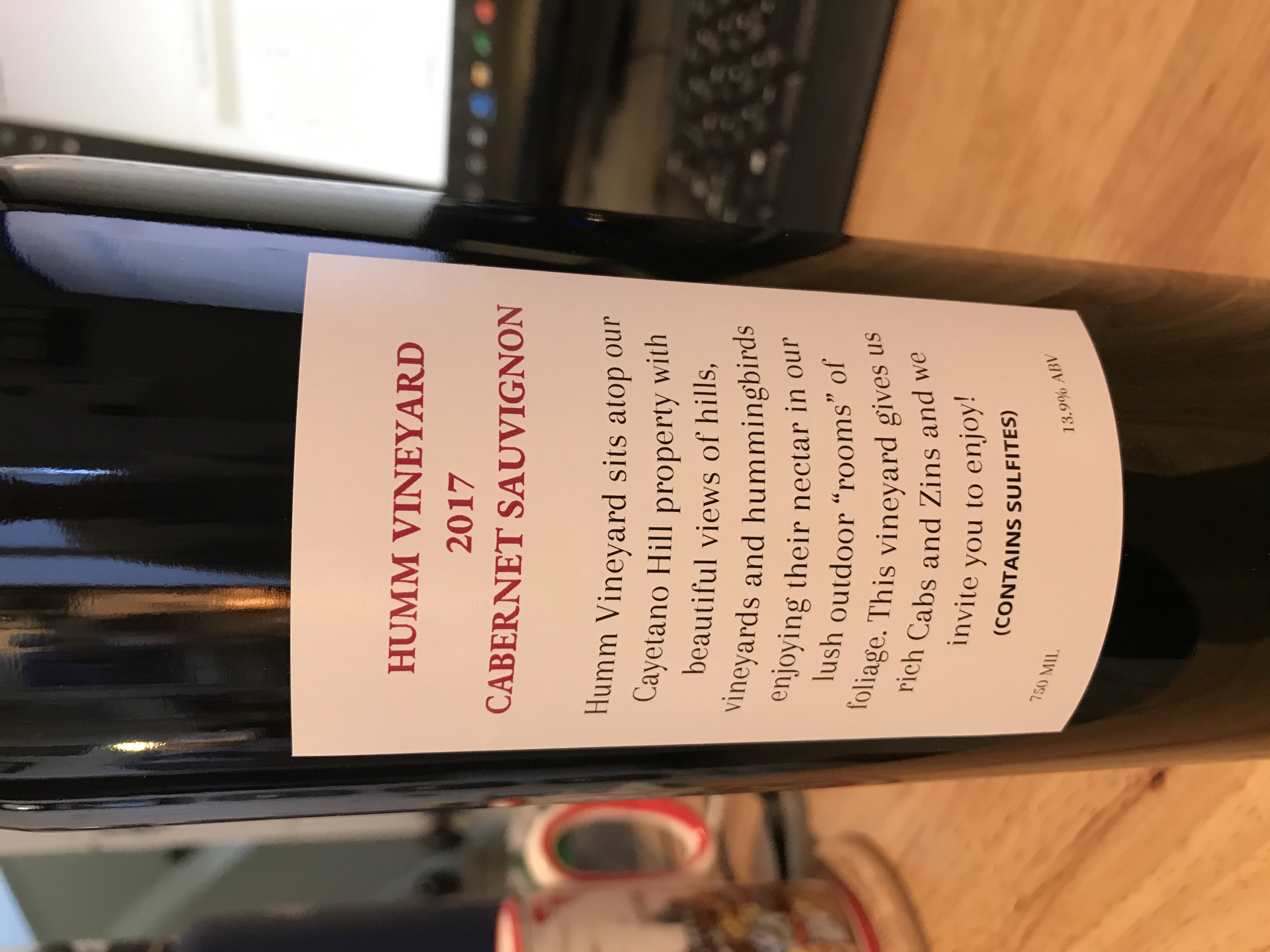 Back label of Humm 2017 Cabernet Sauvignon describing the Cayetano Hill vineyard
