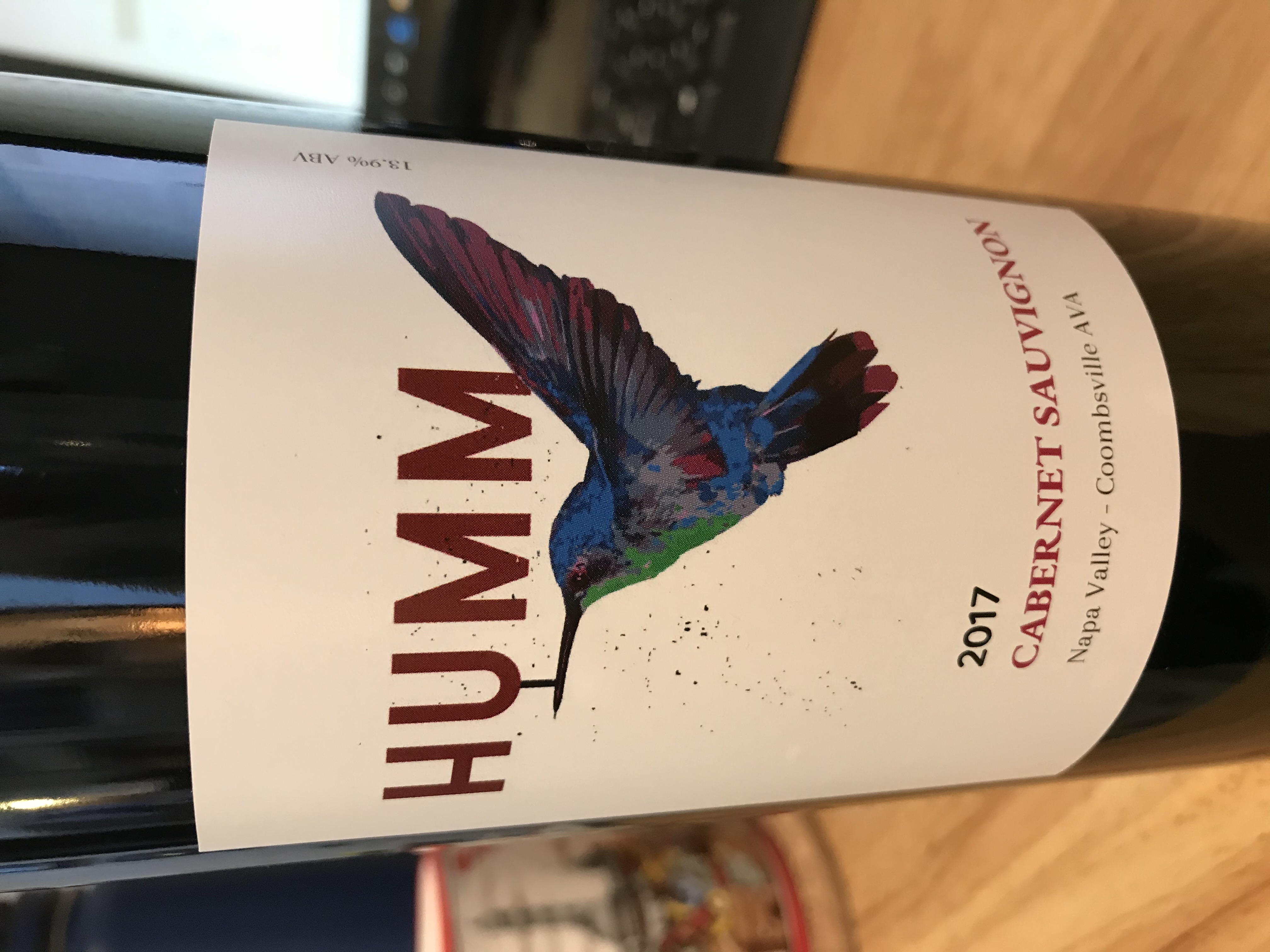 Front label of Humm 2017 Cabernet Sauvignon showing the hummingbird logo